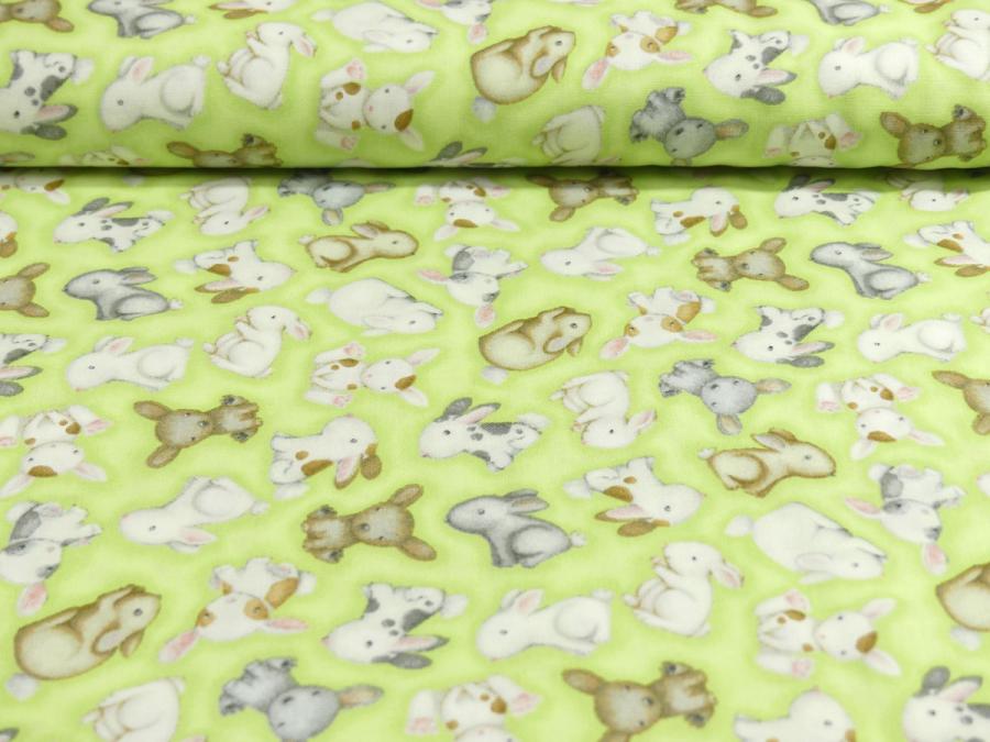 Patchworkstoff mit vielen kleinen Hasenbabies von Henry Glass Fabrics